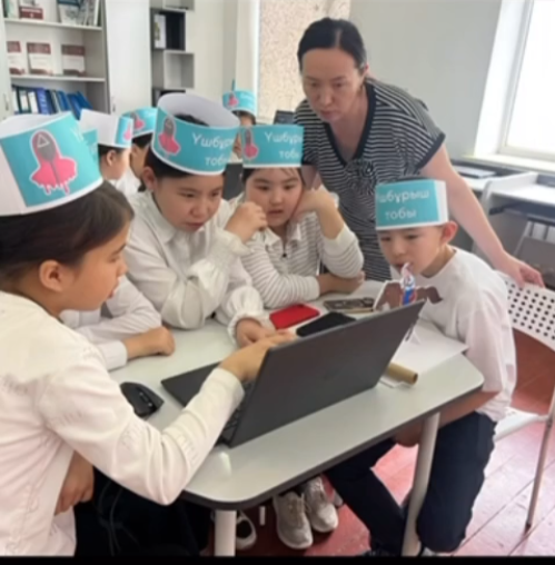 Информатикадағы кальмар ойыны сыныптан тыс сабақ Мақсаты: Оқушылардың логикалық ойлау қабілетін дамыту, пәнге деген қызығушылығын арттыру. Информатика пәнінің мұғалімдері: Хайсар Ж, Жұманова А